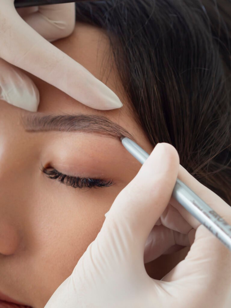 beautician doing microblading treatment client s eyebrows 1